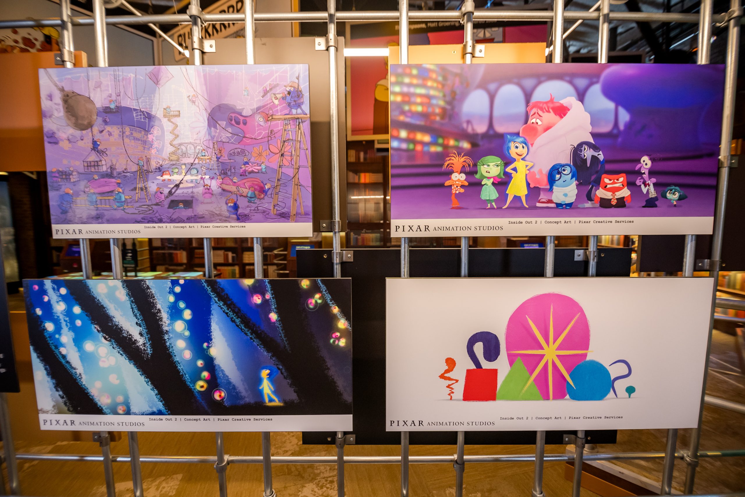Four panels featuring Inside Out 2 concept art at the National Comedy Center.